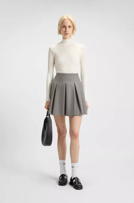 Pleated mini skirt in melange stretch flannel