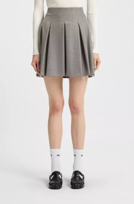 Pleated mini skirt in melange stretch flannel