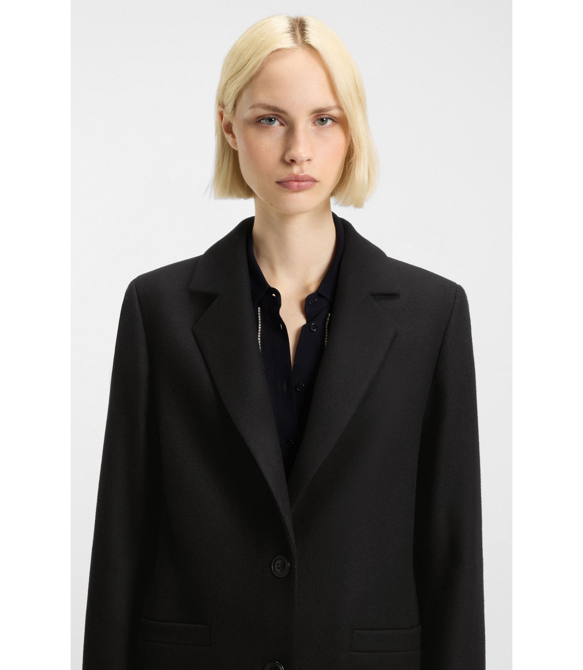 HUGO - Relaxed-fit coat in a wool blend - Black