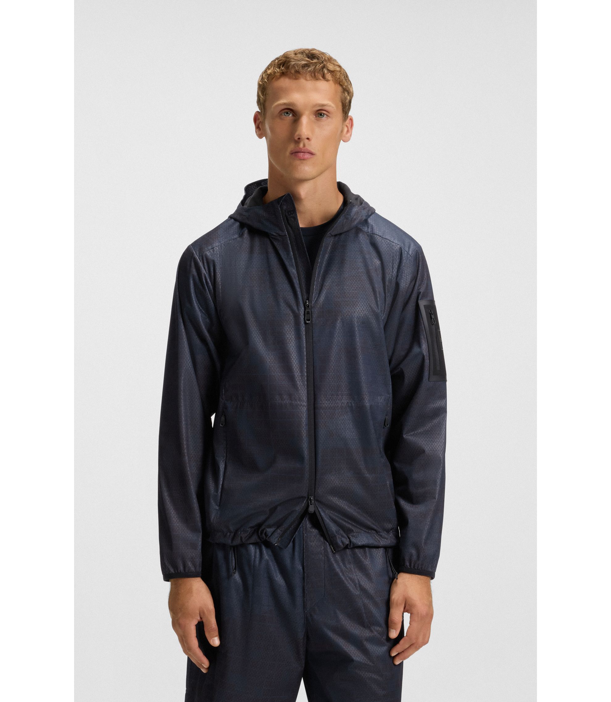 BOSS - Active hooded parka jacket with all-over print - Dark Blue
