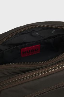 Heuptasje met logoplaatje in vintagelook , Kaki