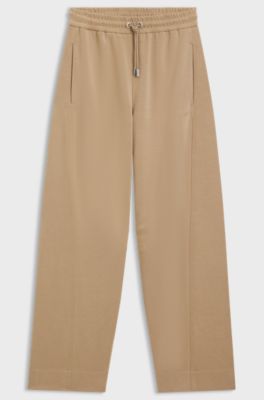 Balloon trousers in stretch jersey with embroidered logo, Beige