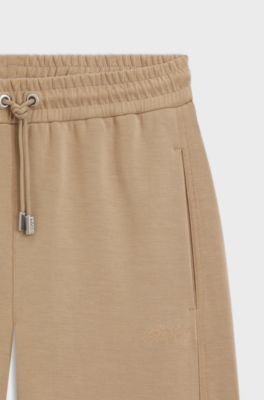 Balloon trousers in stretch jersey with embroidered logo, Beige