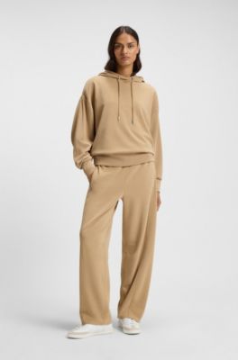 Balloon trousers in stretch jersey with embroidered logo, Beige
