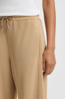 Balloon trousers in stretch jersey with embroidered logo, Beige