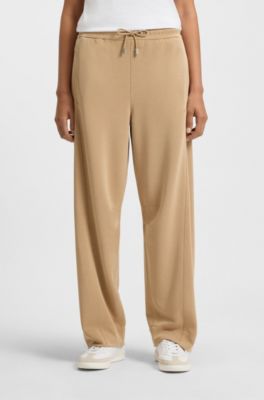 Balloon trousers in stretch jersey with embroidered logo, Beige