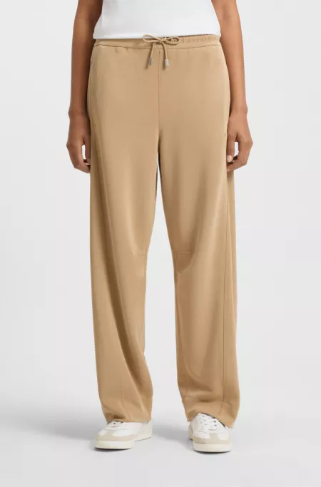 Balloon trousers in stretch jersey with embroidered logo