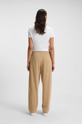 Balloon trousers in stretch jersey with embroidered logo, Beige