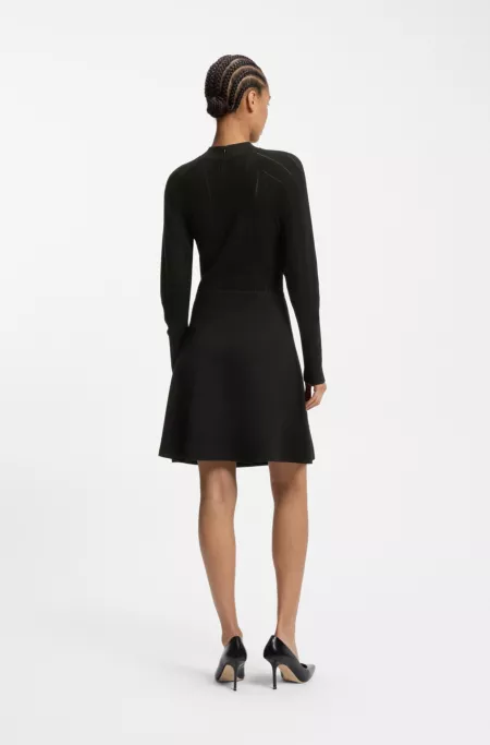 Skater-style knitted dress with lace-stitch detailing