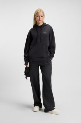 Cotton-terry tracksuit bottoms with rhinestone logo, Black