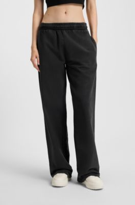 Cotton-terry tracksuit bottoms with rhinestone logo, Black