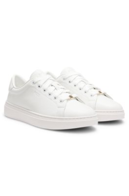 Leather trainers with embossed logos