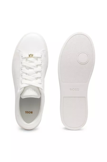 Leather trainers with an embossed logo