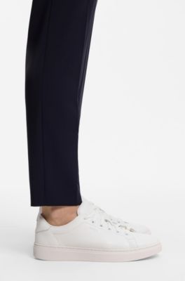 Leather trainers with embossed logos, White