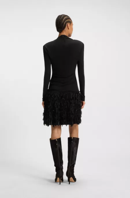 Jersey dress with feathered plissé pleats