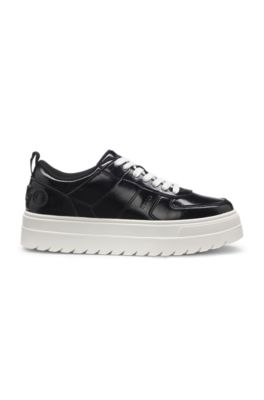 Platform trainers in patent faux leather, Black