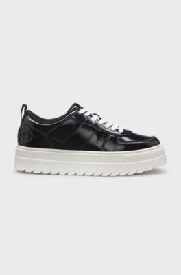 Platform trainers in patent faux leather, Black