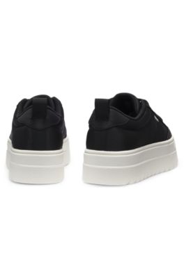 Low-top trainers with platform sole, Black