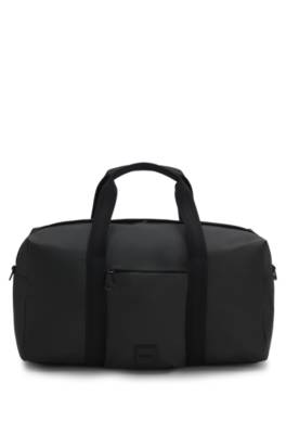 Coated-fabric holdall with logo patch