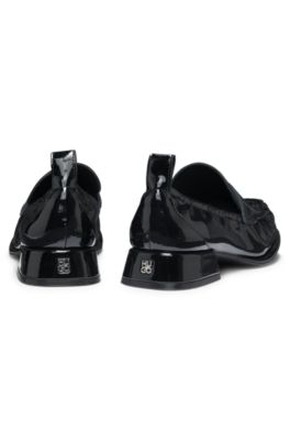 Penny loafers in patent faux leather, Black