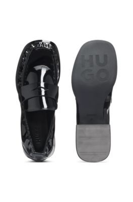 Penny loafers in patent faux leather, Black