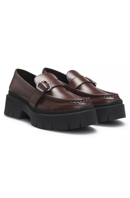 Leather loafers with buckled strap