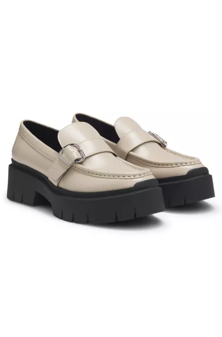 Leather loafers with buckled strap