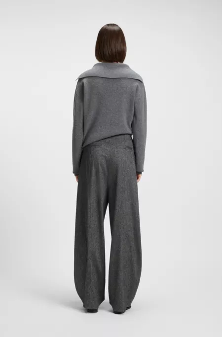 Pantalones oversize fit en tejido elástico estructurado