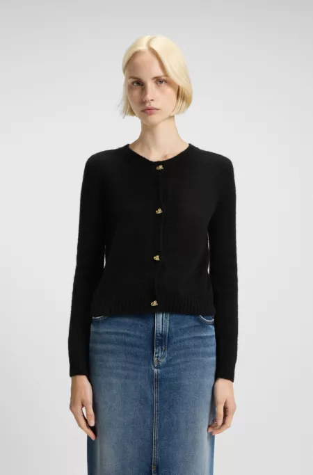 Gilet en maille avec boutons dorés effet nœud