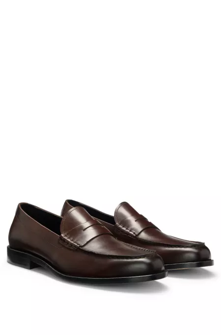 Loafers in smooth leather with penny trim