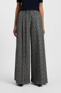 Pantalones regular fit de pernera ancha en tweed de espiga, Gris estampado