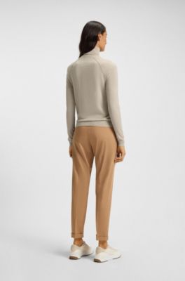 Rollkragenpullover aus Merinowolle, Hellbeige