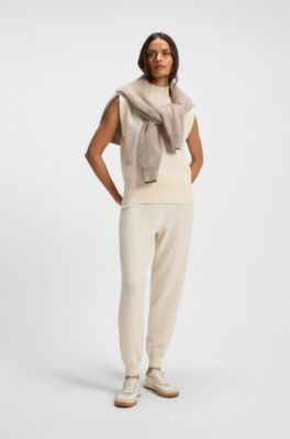 Sleeveless knitted top in cashmere with shoulder patches, White
