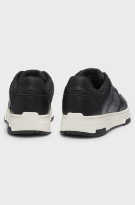 Monogram-detail trainers in faux leather, Black
