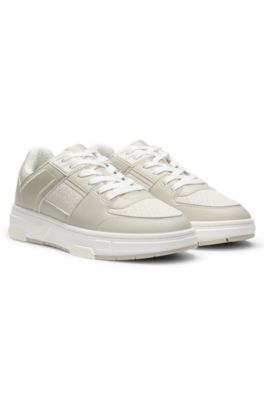 Monogram-detail trainers in faux leather, Light Beige