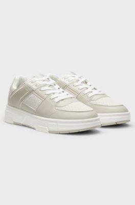 Monogram-detail trainers in faux leather, Light Beige