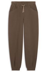 Relaxed-fit tracksuit bottoms with lustrous piping, Brown