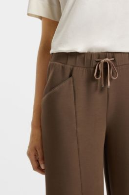 Relaxed-fit tracksuit bottoms with lustrous piping, Brown