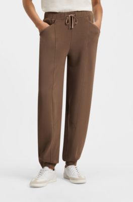 Relaxed-fit tracksuit bottoms with lustrous piping, Brown