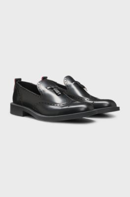 Leather loafers with brogue details, Black