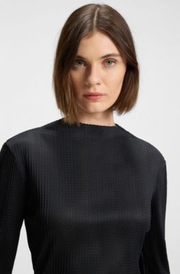 Blusa in jacquard pliss&eacute; con guarnizioni rimovibili in piuma sui polsini, Nero