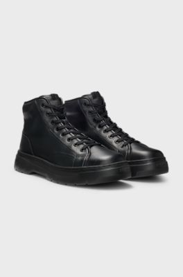 High-top boots in grained leather, Black