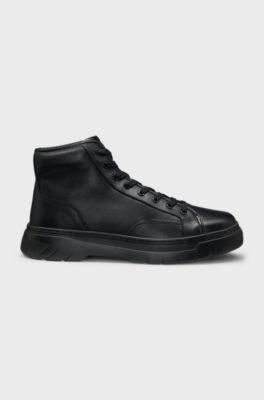 High-top boots in grained leather, Black