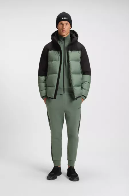 Water-repellent jacket with down filling and detachable hood