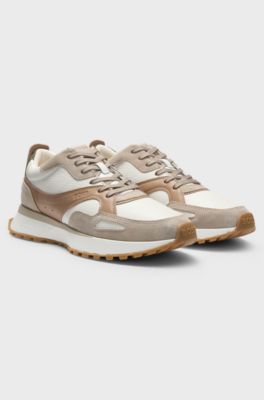 Trainers in tumbled leather with supportive outsole, Beige