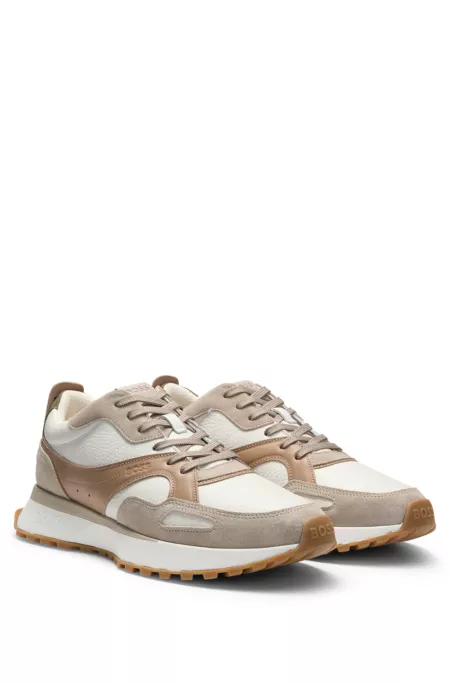 Trainers in tumbled leather with supportive outsole