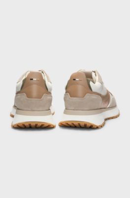 Trainers in tumbled leather with supportive outsole, Beige
