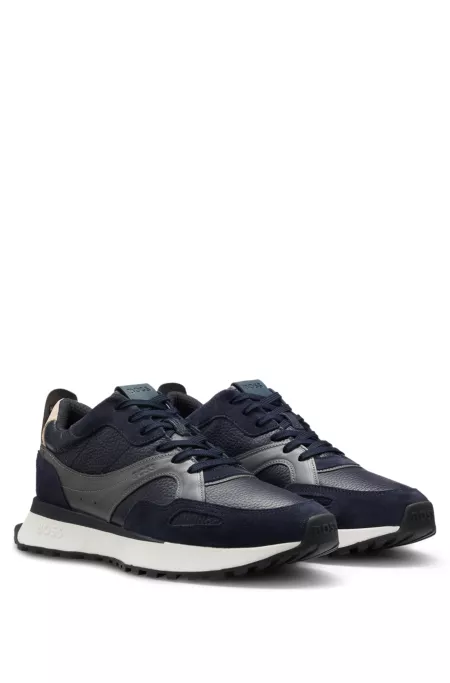 Trainers in tumbled leather with supportive outsole