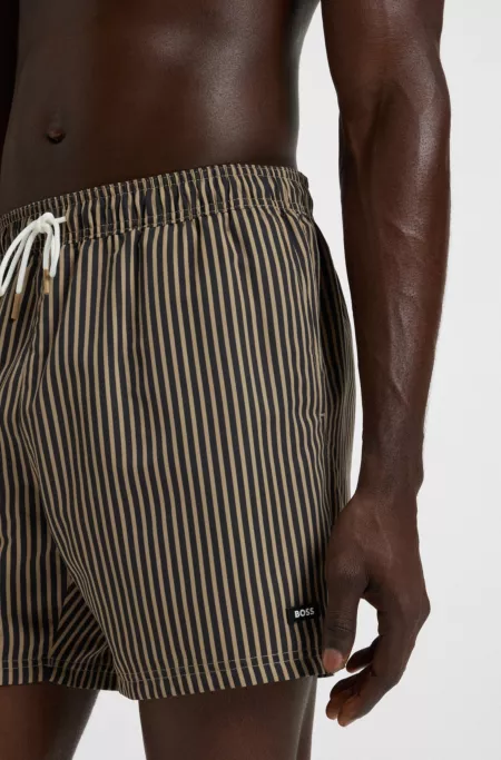 Short de bain à rayures et détails logotés