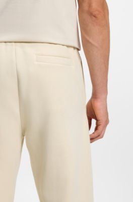 Modern-fit tracksuit bottoms in peached cotton, Natural